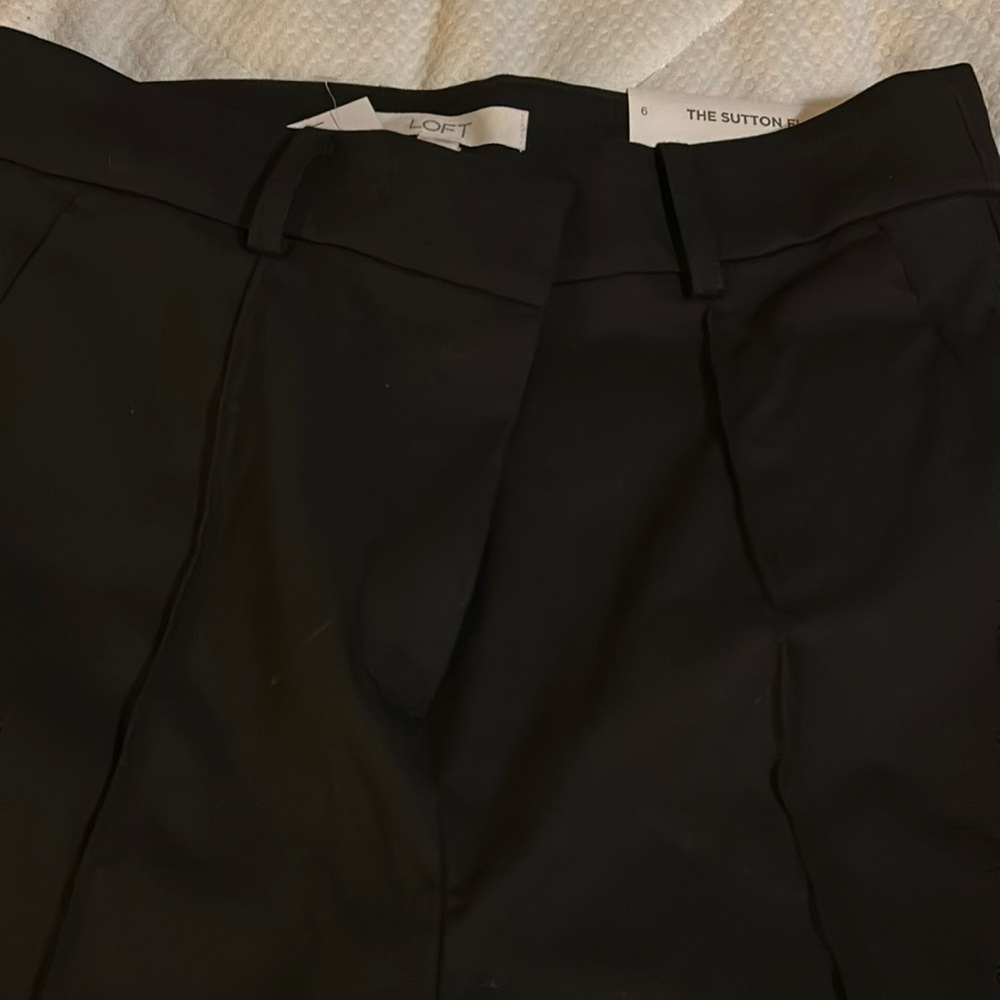 Brand new with tags black dress pants.